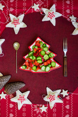 Christmas dinner lunch healthy food on red tablecloth with vegetables
