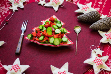 Christmas dinner lunch healthy food on red tablecloth with vegetables