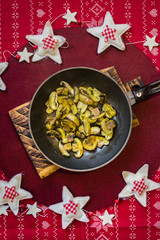 Christmas dinner lunch healthy food on red tablecloth with vegetables