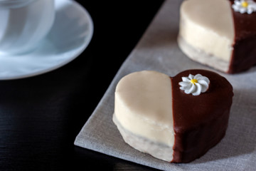 Chocolate covered biscuit in the shape of a heart