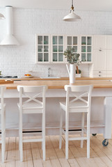 Kitchen table with kitchen chairs. Kitchen background.