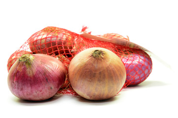 Pack of red onions isolated