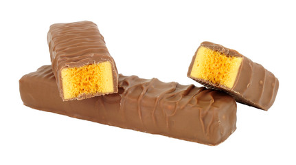 Chocolate covered honeycomb toffee bars isolated on a white background