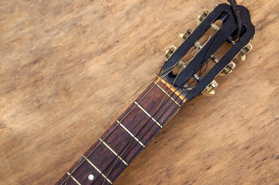 Broken guitar strings, guitar repair