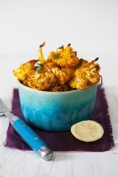 Roasted Cauliflower Bites with Spices, Garlic and Lemon