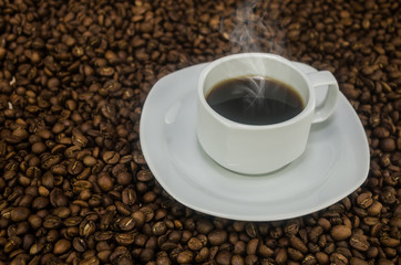 Coffee mug over grain texture