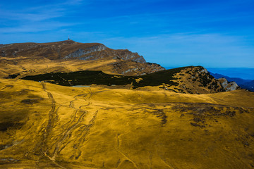 National Park Bucegi of Carpathians mountains seen from Furnica peak, Cota 2000, Sinaia Resort, Prahova county, Romania. Autumn season. Plateau Bucegi  with route to Babele, Piatra Arsa and Caraiman.