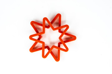 Cookie cutter star shape on white background