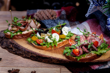  Bruschetta with cheese Myba bacon, meat, sauce, cherry tomatoes,  New Year's menu