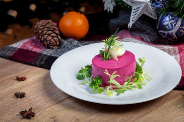 Fototapeta na wymiar Russian New Year's salad, herring under a fur coat