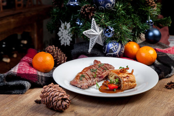 Obraz na płótnie Canvas Steak with mushrooms, New Year's menu