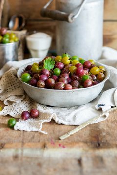 Fresh gooseberries in a metal bowl