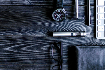 coffee, electronic cigarette, mens accessories dark wooden backg