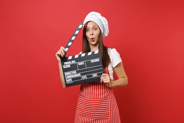 Housewife female chef cook or baker in striped apron, white t-shirt, toque chefs hat isolated on...