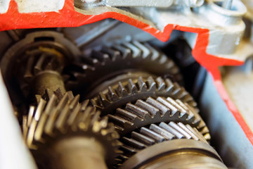 Gear box or transmission with helical gears of modern car in driving school