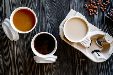 coffee cup take away at wooden background top view