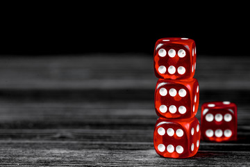 concept luck - dice gambling on dark wooden background