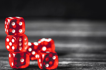 concept luck - dice gambling on dark wooden background
