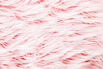 Pink fluffy fur background.  Flat lay, top view