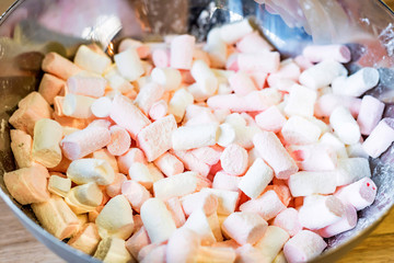 Colorful marshmallows close up in a bowl