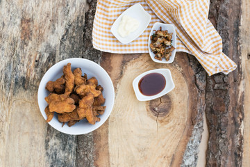 Breaded chicken breast with barbecue sauce and mayonnaise