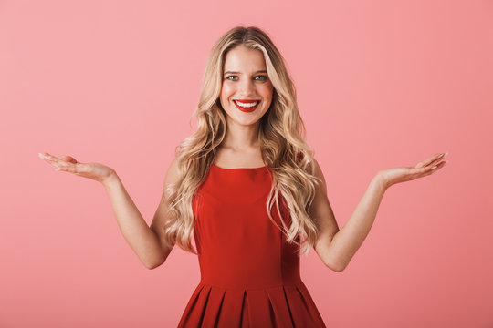 Portrait of a smiling young woman in red dress - Powered by Adobe