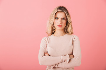 Portrait of an upset young woman wearing sweater