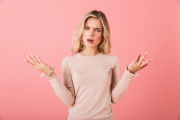 Portrait of an upset young woman wearing sweater