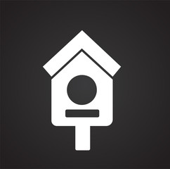 Birdhouse on black background icon