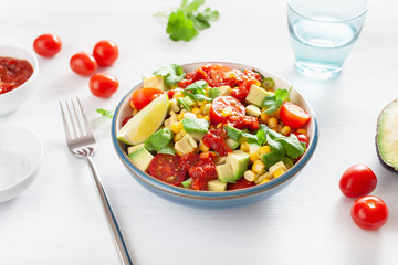 healthy vegan avocado sweetcorn tomato salad