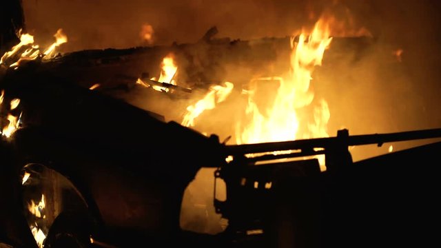 Burning Car Sedan, Fire Under the Soot, Close-up
