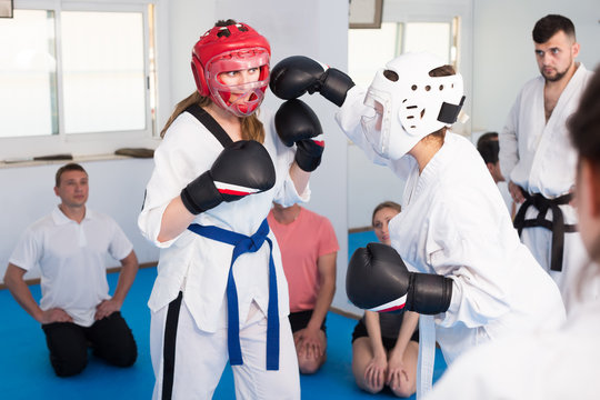 Women karate perform indicative sparring