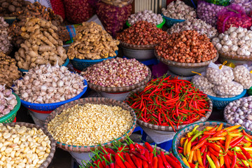 Fresh vegetables and fruits in traditional street market in Hanoi, Vietnam.