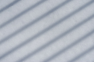 Background of fresh white snow sparkling in the sun texture. Copyspace for text.