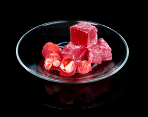 Turkish sweet delights rahat-lokum isolated on black background