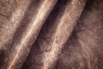 Brown vintage buckskin leather as background wallpaper with copy space - obrazy, fototapety, plakaty