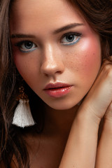 beauty portrait of young female with makeup - 234491466