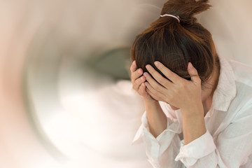 Vertigo illness concept. Woman hands on his head felling headache dizzy sense of spinning...
