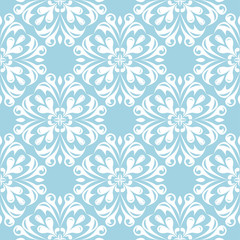 White floral seamless design on blue background