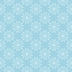 White floral seamless pattern on blue background