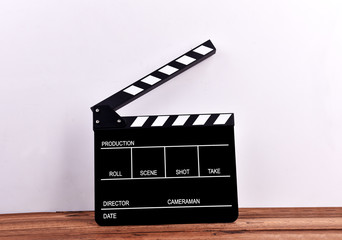 Closeup of movie clapper board on table