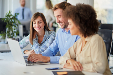 Startup concept -  creative team talking in office
