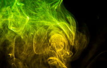Colored smoke on black background