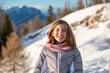 Little girl on holiday in the snow