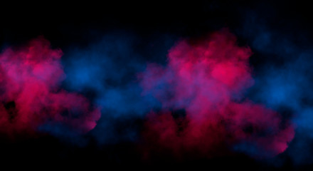 Multicolored smoke on a dark background. 