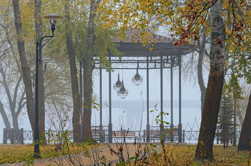 The concept of foggy weather in the city. Foggy autumn morning in the Park Natalka. Obolon district, Kyiv, Ukraine
