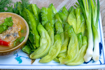 Chili paste fresh vegetable on table
