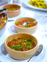Pindjur and Lutenitza Traditional Macedonian food. homemade product in a ceramic bowl