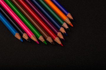 Color Pencils On Black Background