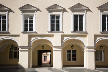 Fototapeta na wymiar Traditional classic European restored building facade with columns and windows